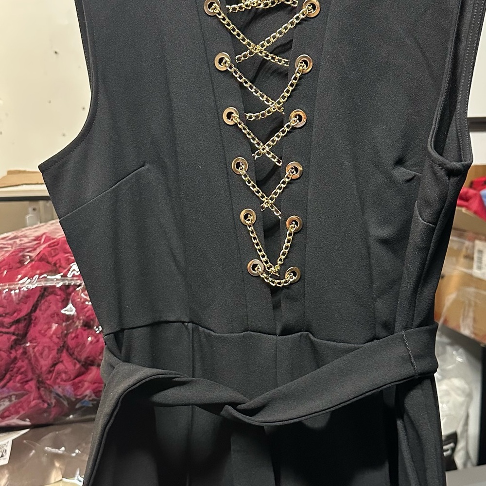 Elegant Black Dress with Chain Detail